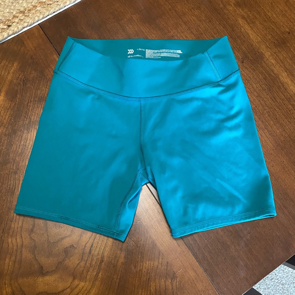 Girls size large teal biker shorts. All in motion brand